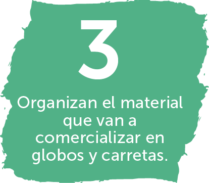 Imagen de fondo, 3. Organizan el material que van a comercializar en globos y carretas.